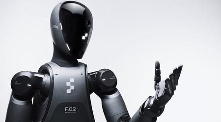 BMW ha mostrato un robot meccanico che carica abilmente parti metalliche in un vero impianto di produzione